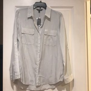 Soft Express blouse with blue pindots. NWT!